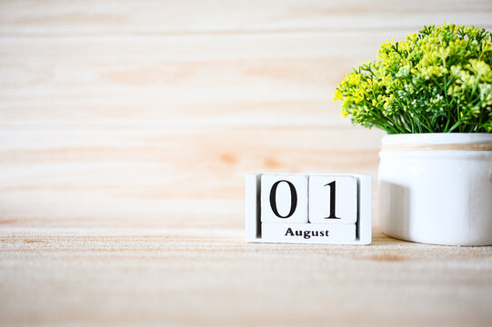 01 August Wooden calendar with Concept Start Hello August