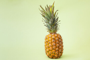 Pineapple green background. Close up. Copy space