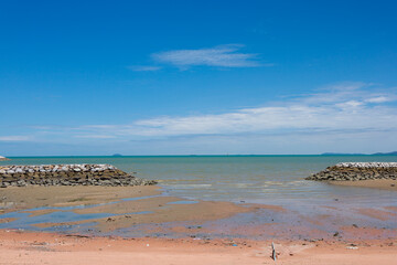 sea and beach on blue sky in summertime