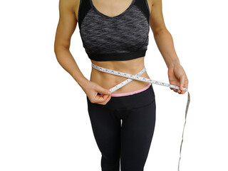 40-year-old housewife with exercise and health care. Girl in exercise clothes And waist tape...