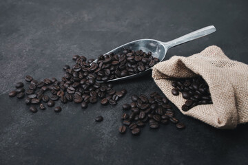 Coffee cup and beans on old kitchen table. Top view with copyspace for your text