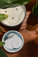 spa still life with towel and candle with green plant
