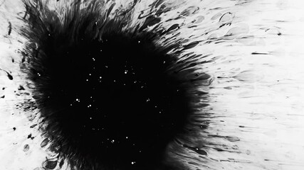 Black ink shot. Surreal darkness. Dirt stain with copy space spreading on white art background.