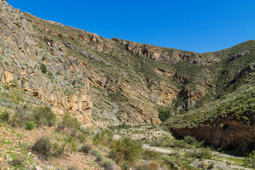 Mountainous landscape with a canyon in the center