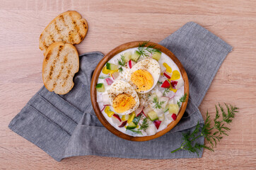 Cold soup with raw vegetables and eggs