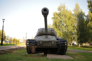 Old battle tank under the trees, fought in the 2nd world war.