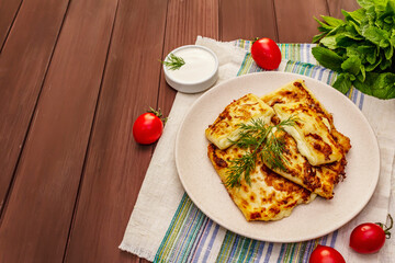 Hot appetizer - pita bread with cheese and herbs. Vegetarian healthy food