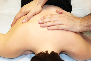 Fototapeta na wymiar Manual therapy or massage in the thoracic area.