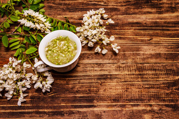 Tea from fresh acacia petals. Hot drink, alternative medicine