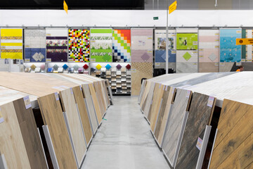 MINSK, BELARUS - April 01, 2020: wide selection of hardware store with samples of wooden parquet for the floor