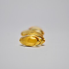 Close up of capsules Omega 3 or fish oil capsules isolated on white background. Healthcare concept