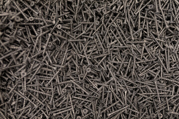 pile of screws close up, hardware store