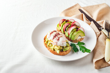 Toast with poached egg and avocado