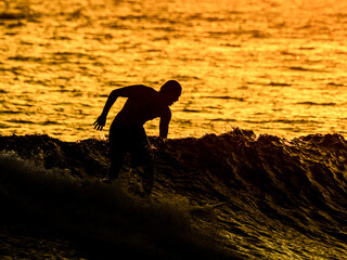 Silhouette Surfer at Sunset