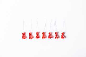 Step by step instruction how to make a Christmas tree. Macaroni in form of animals are painted with...