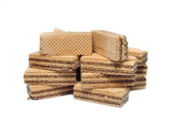 Vanilla wafers isolated on white background. Wafers filled with chocolate and vanilla cream. Crunchy dessert.