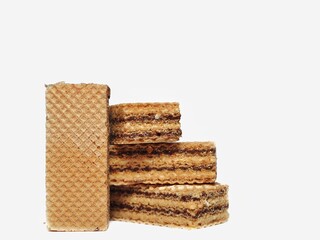 Vanilla wafers isolated on white background. Wafers filled with chocolate and vanilla cream. Crunchy dessert.