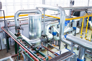 Industrial heating system. Modern gas boiler for heating residential areas of the city.
