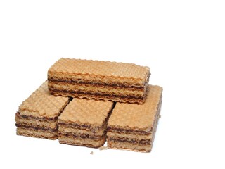 Vanilla wafers isolated on white background. Wafers filled with chocolate and vanilla cream. Crunchy dessert.