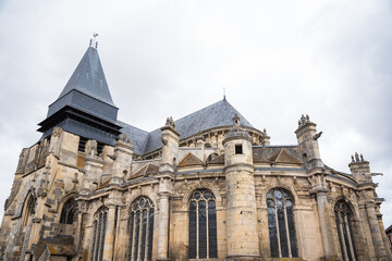 Fototapeta na wymiar Church of Saint-Jacques and Saint-Christophe in Houdan, Ile-deFrance, France. Back view. 