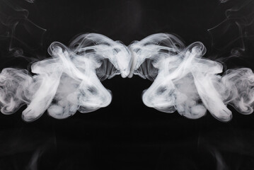 White steam on a black background.