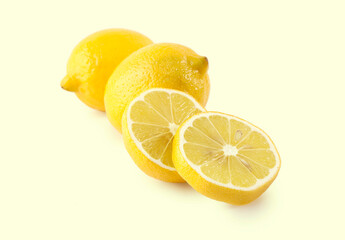 Lemon isolated on yellow background.