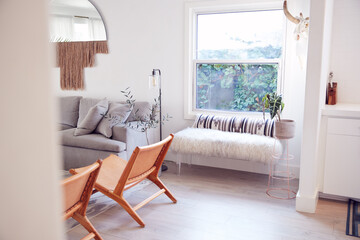 Interior View Of Beautiful Lounge With Sofas And Chairs In New Family House