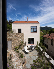 Small rustic country house exterior, nobody around and Swiss linear architecture