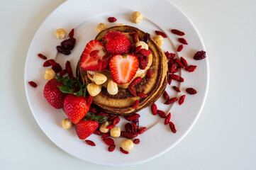 Delicious pancakes with strawberries