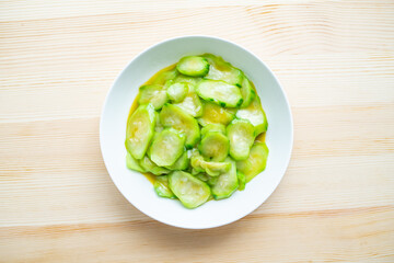 A dish of fried vegetable gourd on a table