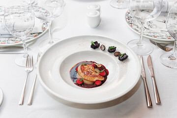 Foie gras on table, toned