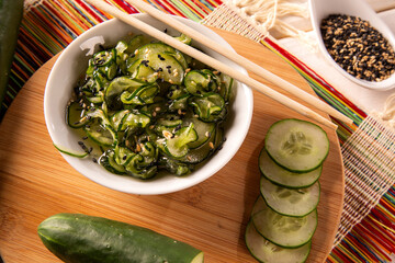 Sunomono - Japanese Cucumber Salad with sesame seeds.