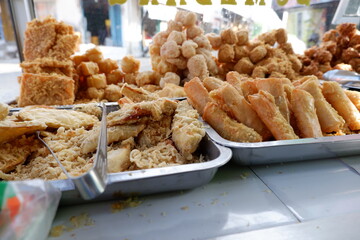 Gorengan is a typical snack from Indonesia. Usually consists of tempeh, tofu, cassava, or bananas. This food is usually sold by street vendors at cheap prices.