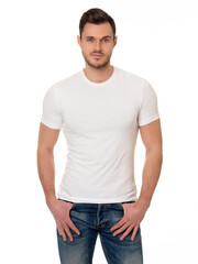 The young man in a white t-shirt on a white background. Template of a white t-shirt. Front view