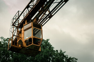 Old construction cranes at the construction of sky