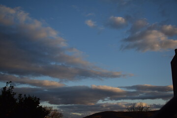 the landscapes and the sky cloudy at sunset.