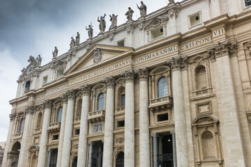 Fototapeta na wymiar Vatican City. Low angle view of the façade of the Basilica in Rome, Italy