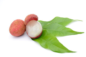 the red ripe lychee with green leaves isolated on white background.