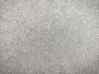 Grey color background texture in daylight. Top view