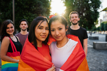 Portrait group of young people demonstration for rights at the gay pride in the city - Two...