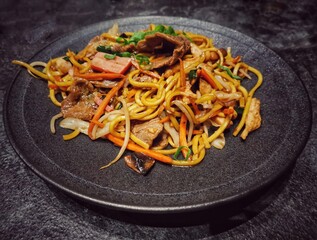 Wok noodles didh on a plate