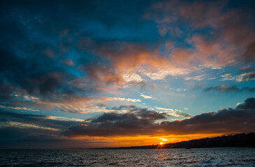 Fototapeta na wymiar Colorful sunset over the sea