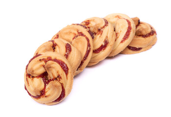 Group of shortbread cookies decorated with jam