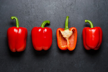 Red pepper on a black background. Paprika. The species capsicum annuum. Copy space