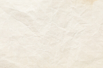 Old pale yellow crumpled paper background texture