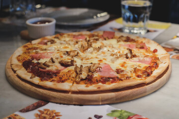 pizza on a wooden board