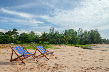 beach chairs on a tropical beach