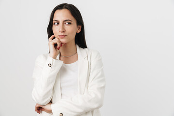 Photo of serious attractive businesswoman thinking and looking aside