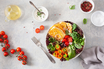 ketogenic paleo diet lunch bowl. halloumi cheese, avocado carrot cucumber salad leaves