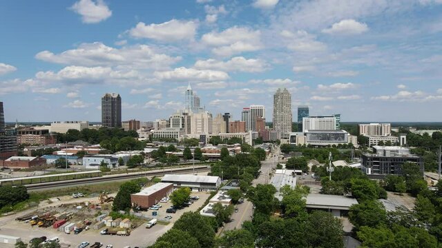 4K Downtown Raleigh North Carolina Daytime with Clouds and Cars - Slow then fast towards the city. 
